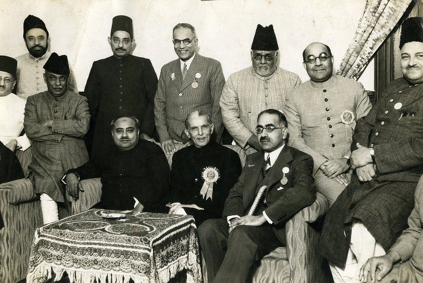 Lahore: Mr Jinnah (center), Sir Sikander Hyat Khan (right), Sir Nizam-ud-Din (left), Liaquat Ali Khan & other Muslim Leagues Leaders