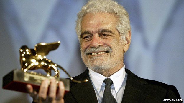 Holding the Venice Film Festival Career Golden Lion Award
